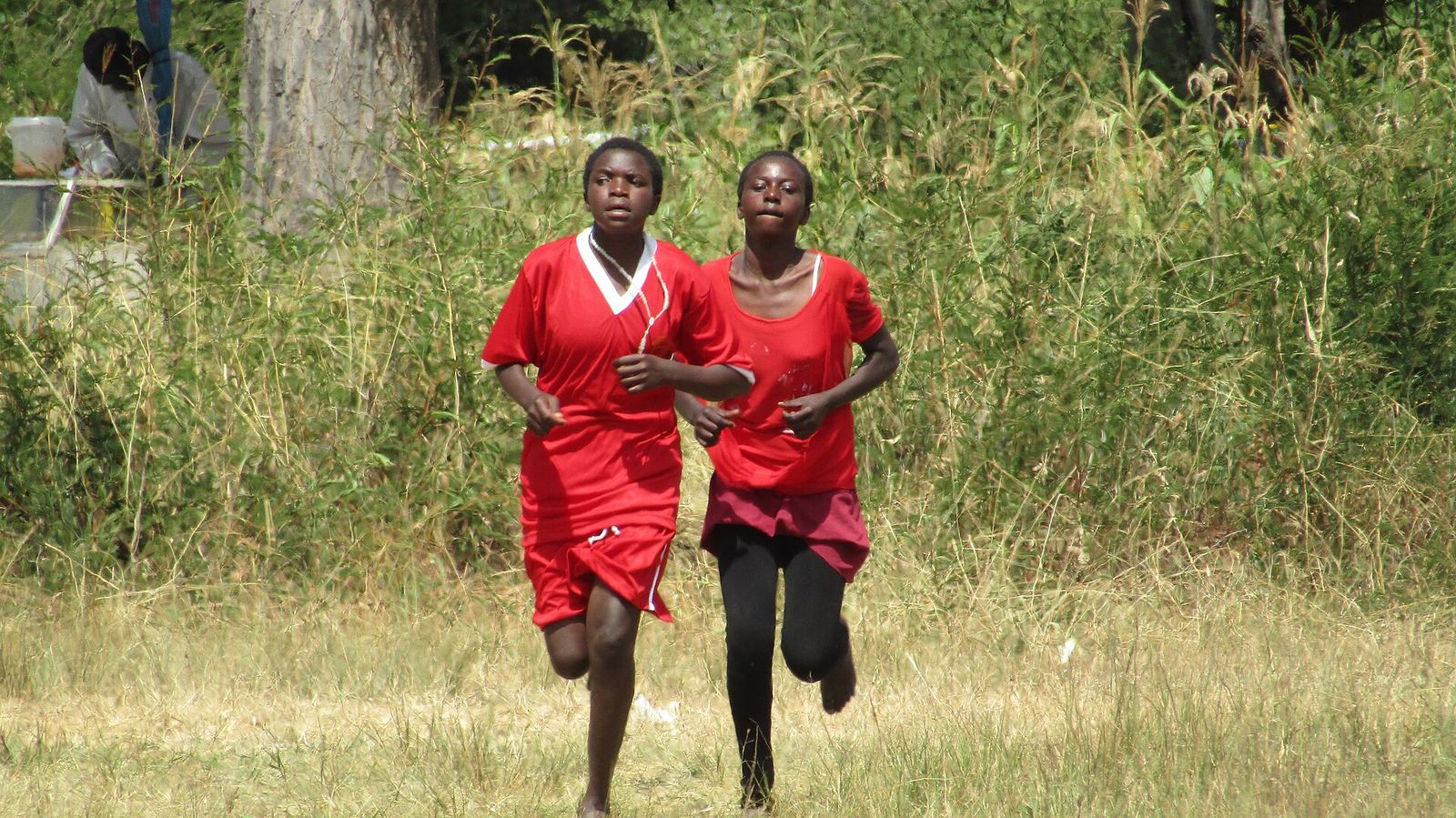 schoolgirls competing in a running race